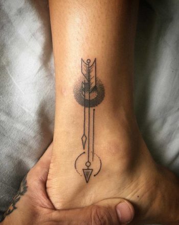 Arrow on an ankle by Kirk Budden