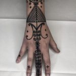 Beautiful ornament on a hand by Tine DeFiore