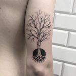 Black and grey tree tattoo by tattooist Smutek