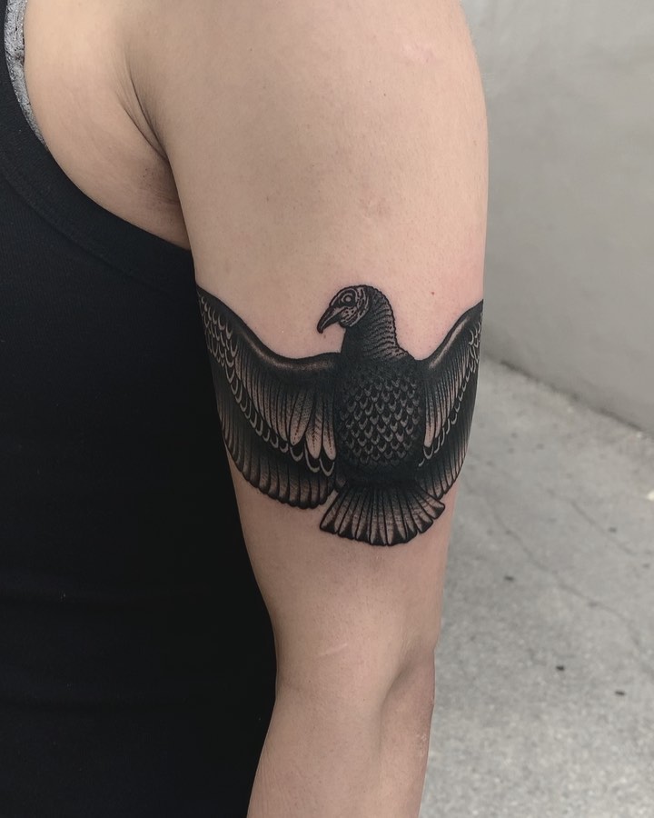 Black vulture tattoo by Javier Betancourt
