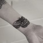 Blackwork moth tattoo by Oliver Whiting