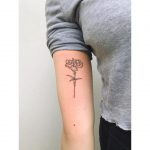 Carnation flower tattoo by Zaya Hastra