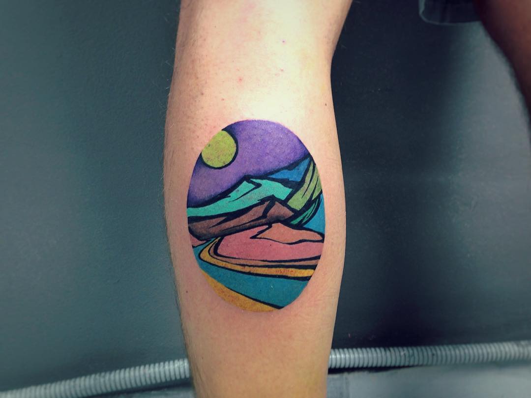 Colorful landscape on the left calf by Eugene Dusty Past