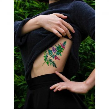 Colorful leaf tattoo by Mavka Leesova