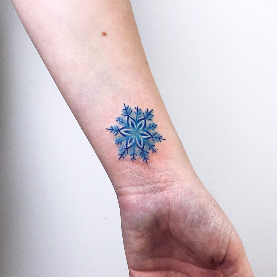 Cover up snowflake tattoo by Valeria Yarmola