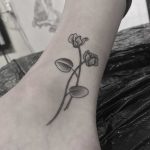 Cyclamen tattoo by Oliver Whiting