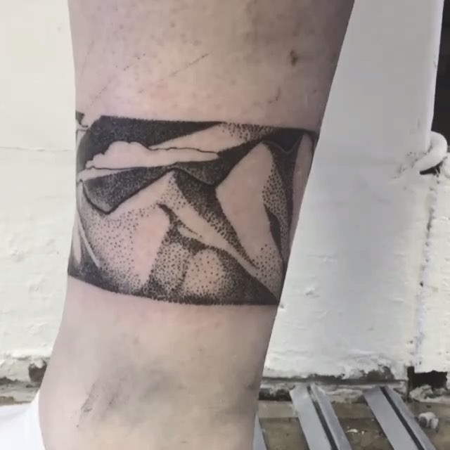 Dot-work mountains tattoo by Annelie Fransson