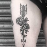 Floral arrow tattoo by Lozzy Bones