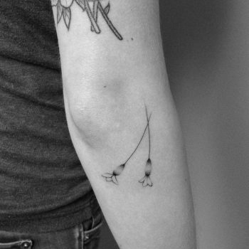 Hand-poked Spanish lavender tattoo by Lara Maju