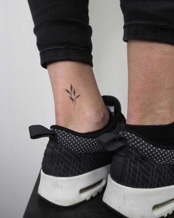 Hand-poked ankle piece by Lara Maju