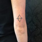 Hand-poked bow and arrow by Kirk Budden
