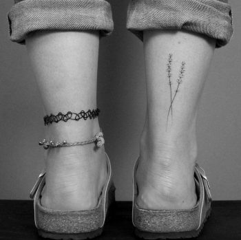 Hand-poked lavender on an ankle by Lara Maju