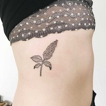Hand-poked lilac tattoo by Kelli Kikcio