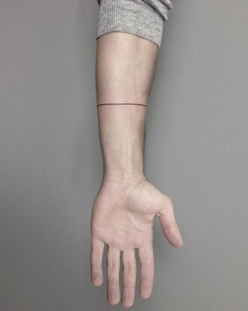 Hand-poked line tattoo by Lara Maju