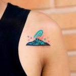 Hand-poked mountain and galaxy by zzizziboy