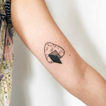 Hand-poked open door onigiri tattoo by Kelli Kikcio