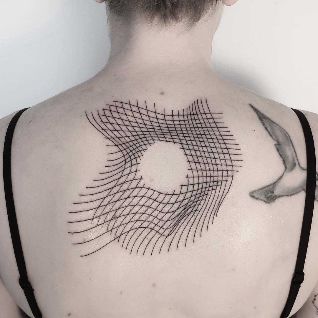 Hole in a grid tattoo by Julim Rosa