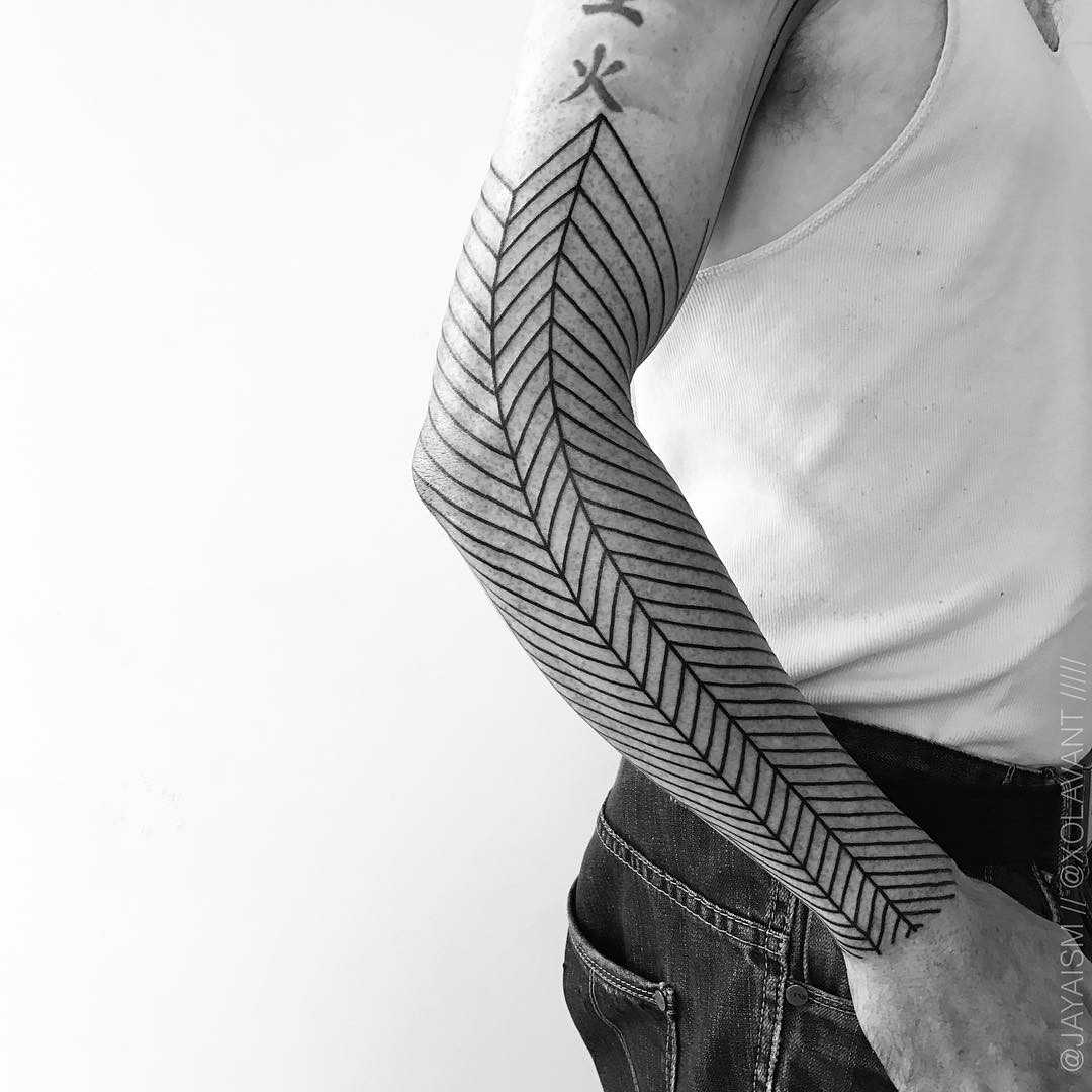 Linear half-sleeve tattoo by Jaya Suartika