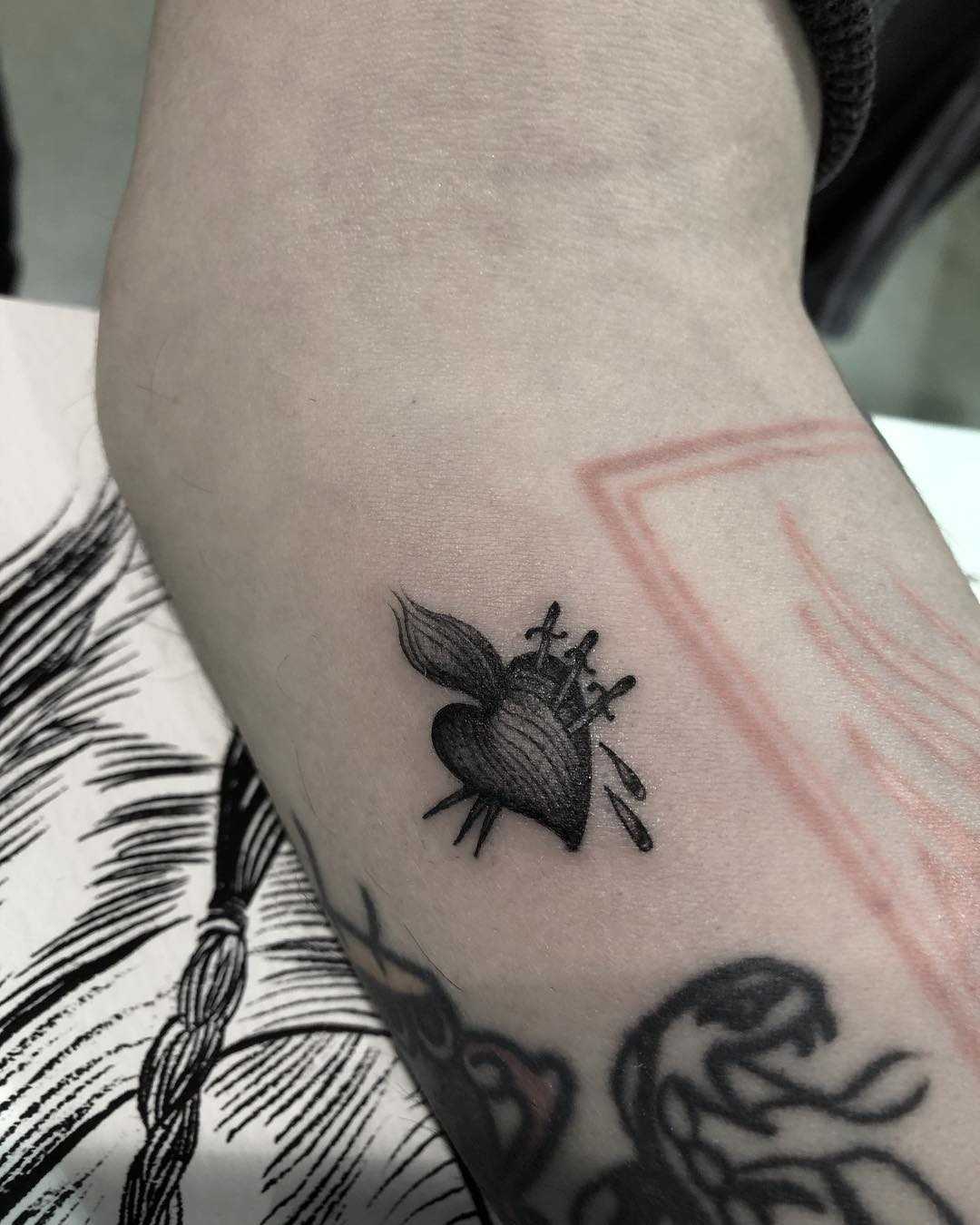 Little sacred heart tattoo by Tine DeFiore