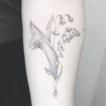 Marguerite, daisy, linnaea borealis, and lilly of the valley tattoo by Annelie Fransson