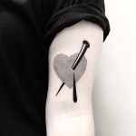 Nail pierced heart tattoo by Pulled Poltergeist