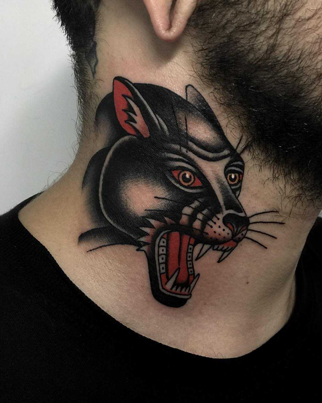 Panther tattoo on a neck by Javier Betancourt