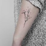 Peony and olive tattoo by Lara Maju