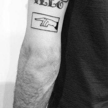 Pointing finger tattoo by Chinatown Stropky
