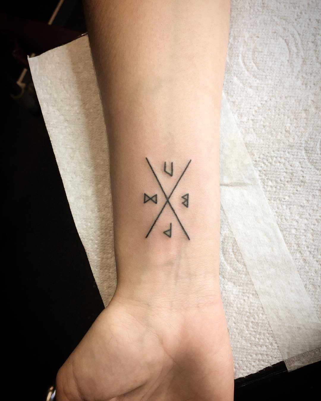 Runes and cross tattoo by Kirk Budden