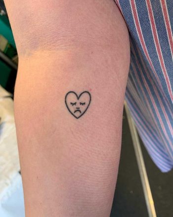 Sad little heart tattoo by Kirk Budden