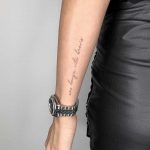 Script tattoo by Conz Thomas