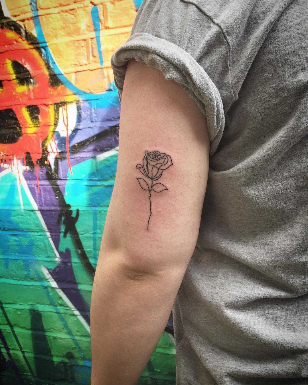 Single line rose tattoo by Kirk Budden