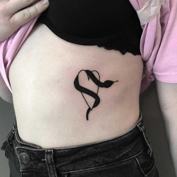 Snake on a heart by tattooist Spence @zz tattoo