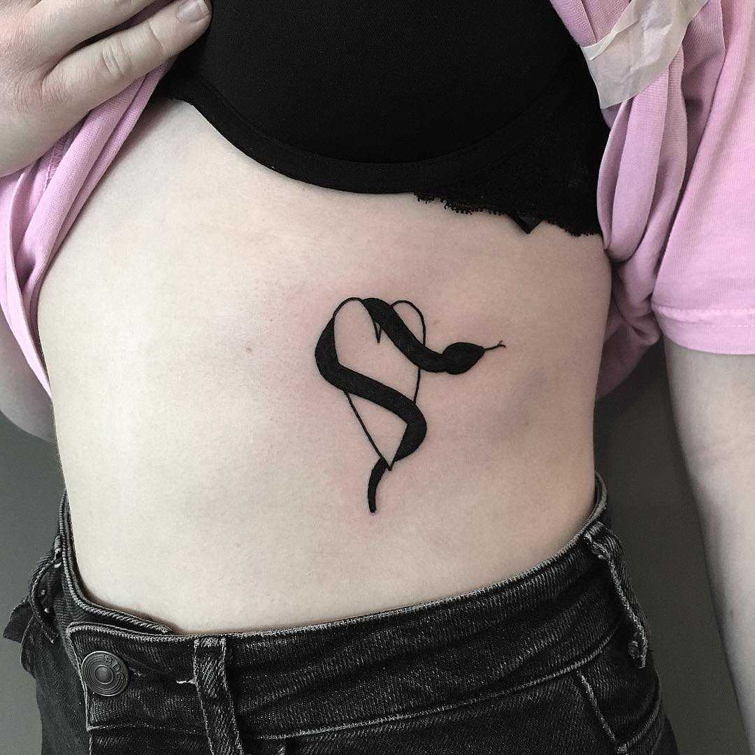 Snake on a heart by tattooist Spence @zz tattoo
