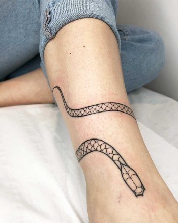 Snake on an ankle by Loz Thomas