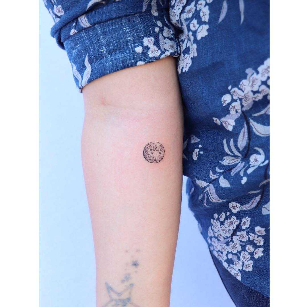 Tiny moon tattoo by Zaya Hastra