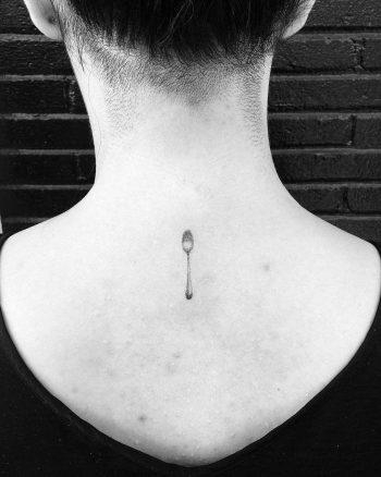 Tiny spoon tattoo by Robbie Ra Moore