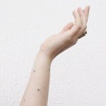 Tiny star tattoos by Stanislava Pinchuk