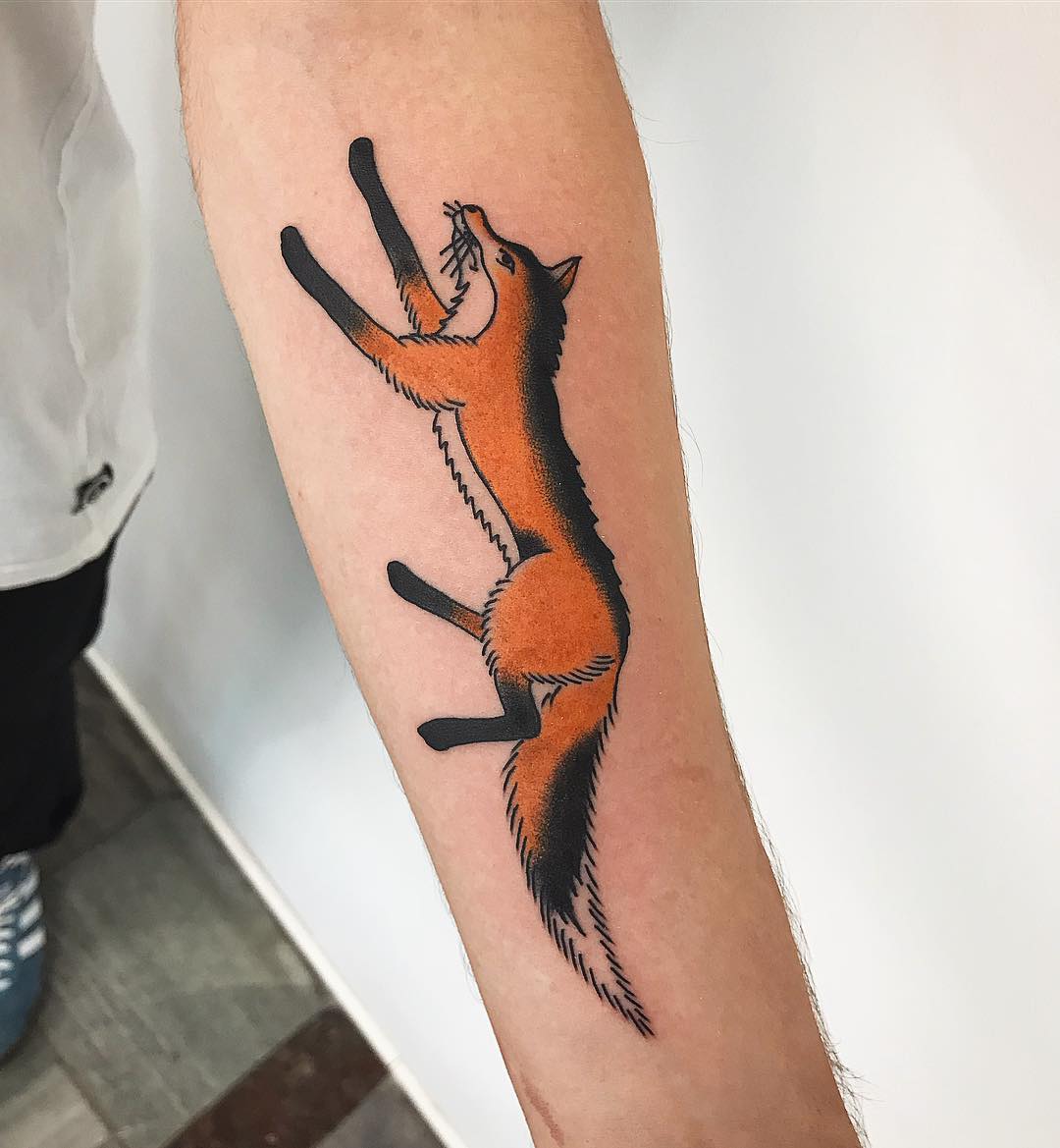 Traditional fox tattoo by Łukasz Krupiński