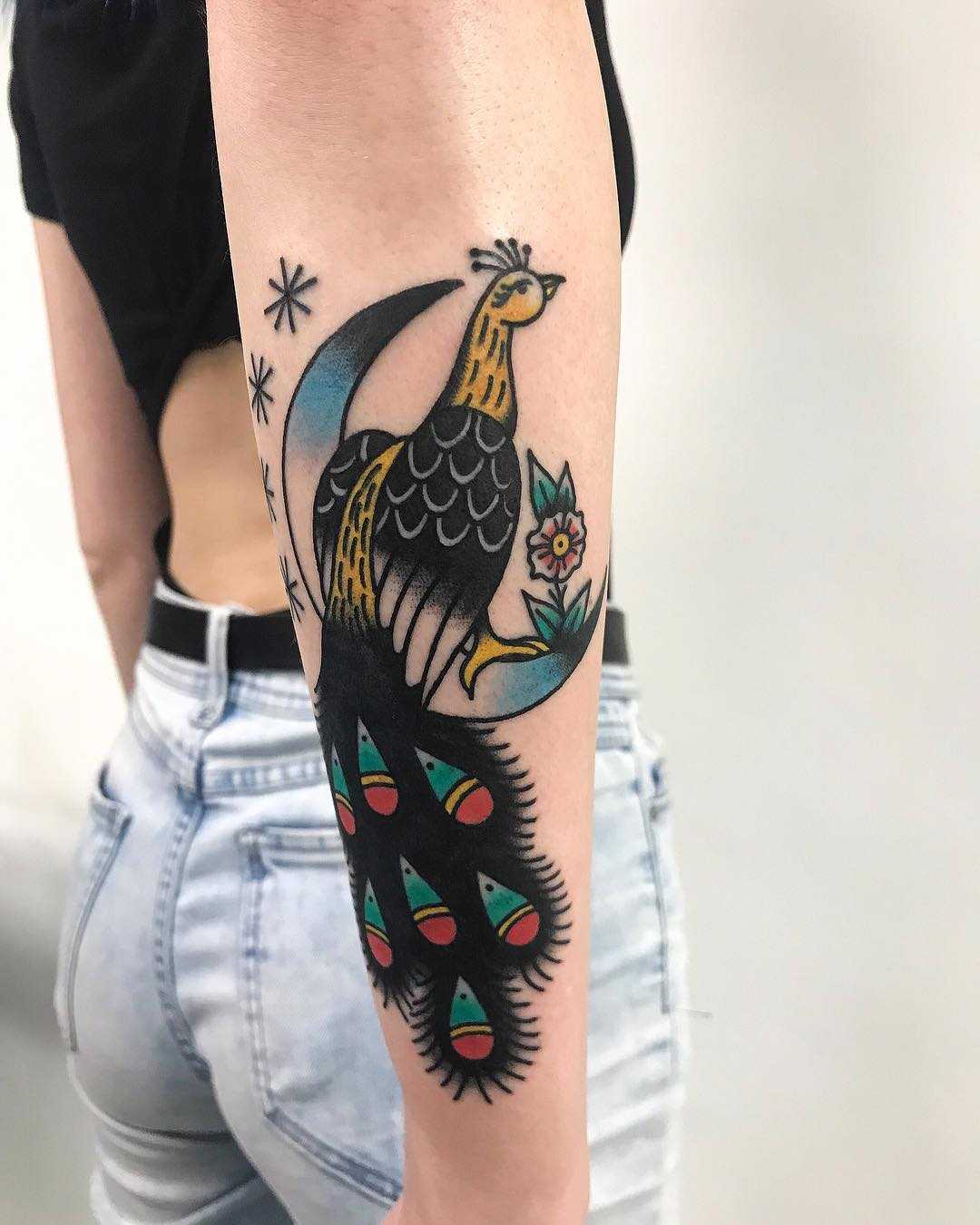 Traditional peacock tattoo by Łukasz Krupiński