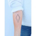 Triple rhombus tattoo by Zaya Hastra