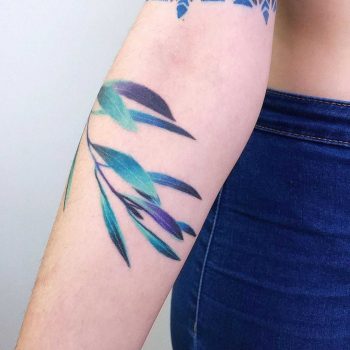 Watercolor branch on a forearm by Valeria Yarmola