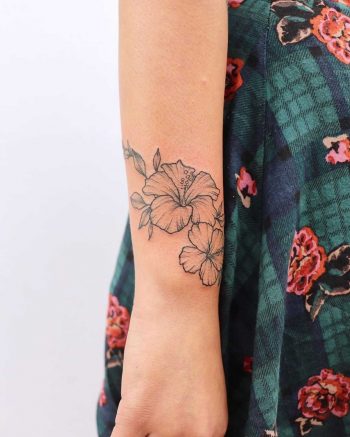 Wrapping hibiscus tattoo by Zaya Hastra