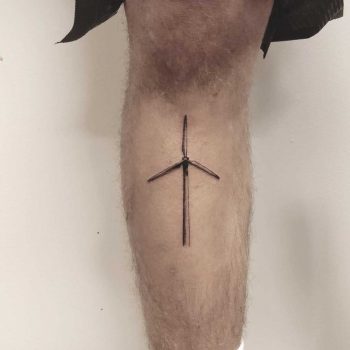 A small windmill tattoo by Annelie Fransson