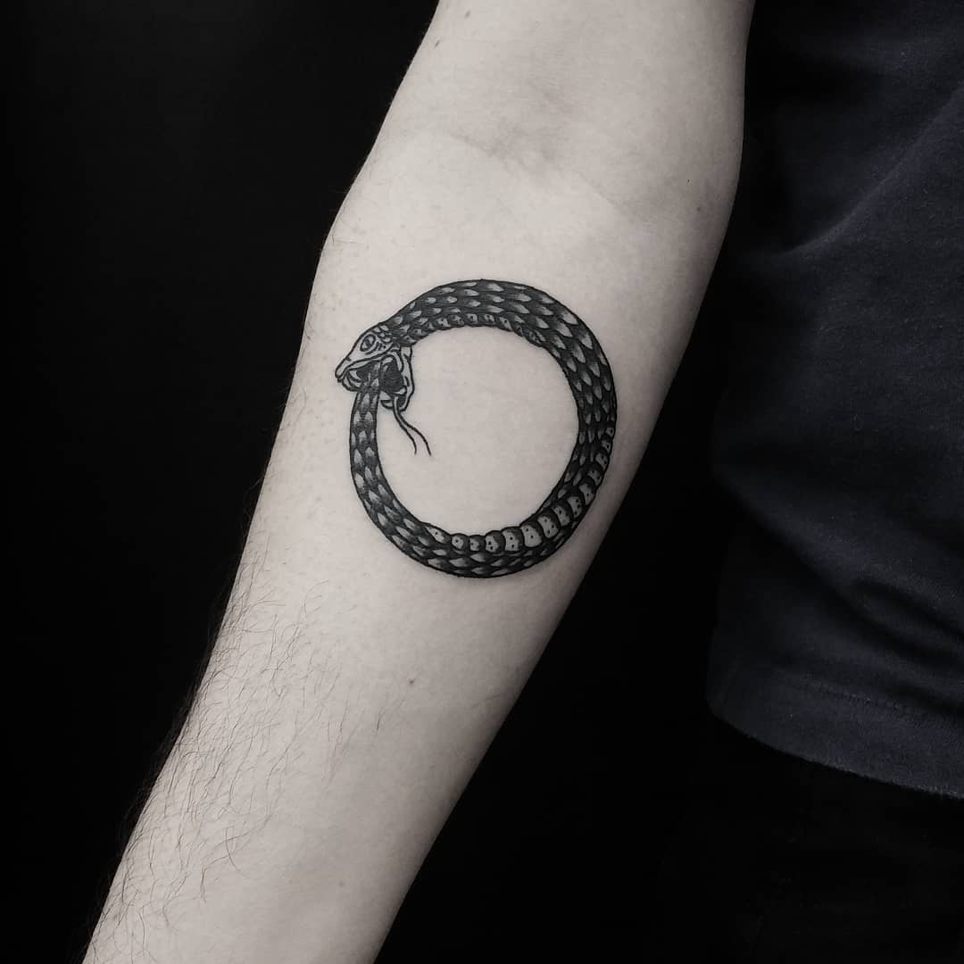 Black Ouroboros tattoo by tattooist gvsxrt