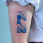 Blue wave tattoo by tattooist Oozy