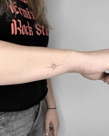 Bright star tattoo by Conz Thomas