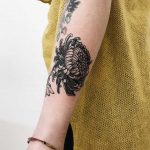 Chrysanthemum tattoo by Finley Jordan