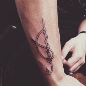 Clinch knot tattoo by Kelli Kikcio