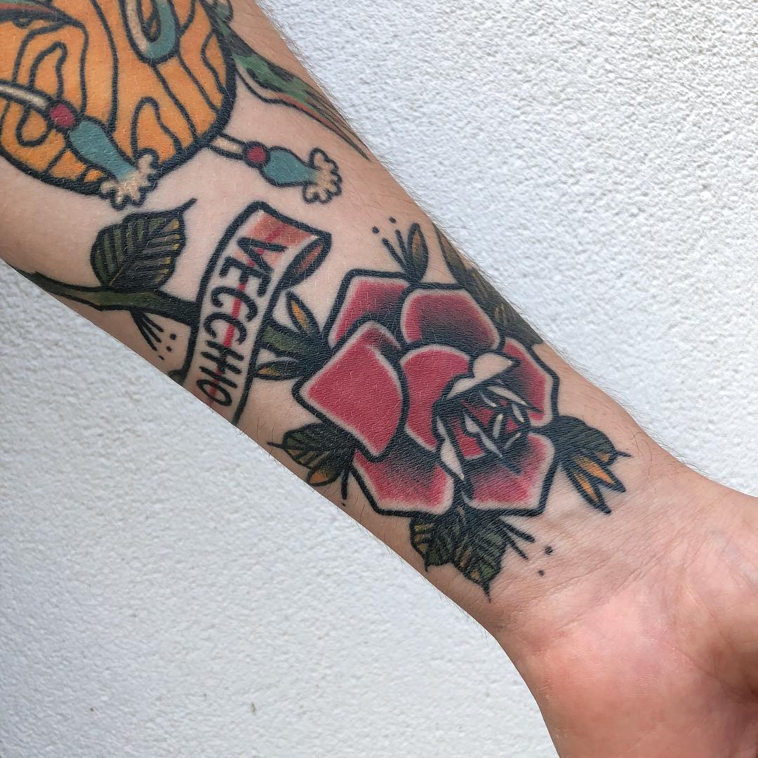Crisp classy rose tattoo by Lara Simonetta